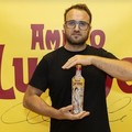 Un artista di Corato disegna la nuova bottiglia per Amaro Lucano